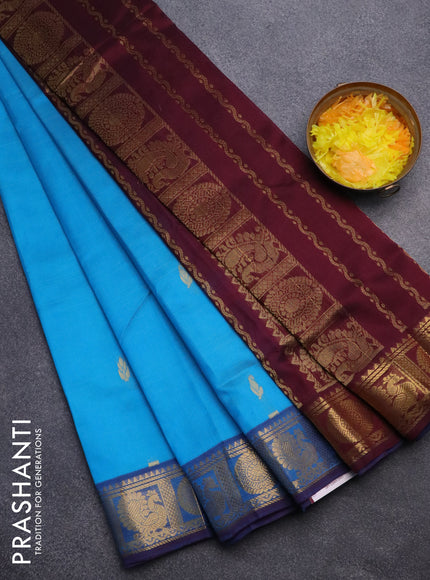 Silk cotton saree cs blue and wine shade with allover zari woven buttas and annam & rudhraksha zari woven border