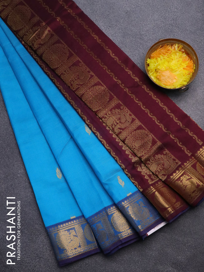 Silk cotton saree cs blue and wine shade with allover zari woven buttas and annam & rudhraksha zari woven border