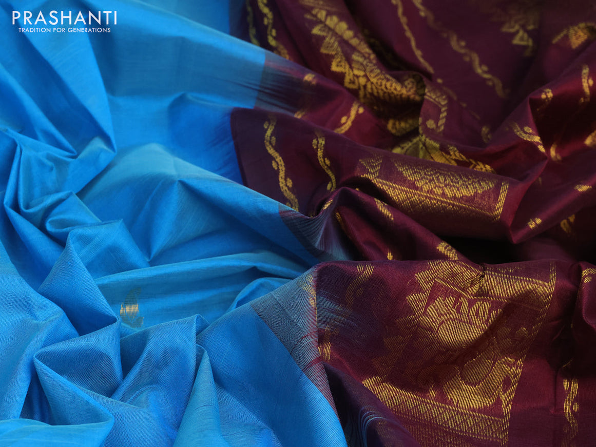 Silk cotton saree cs blue and wine shade with allover zari woven buttas and annam & rudhraksha zari woven border