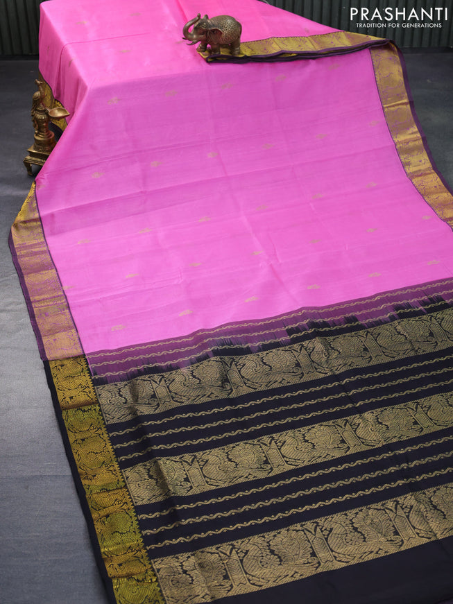 Silk cotton saree light pink and black with zari woven buttas and annam zari woven border