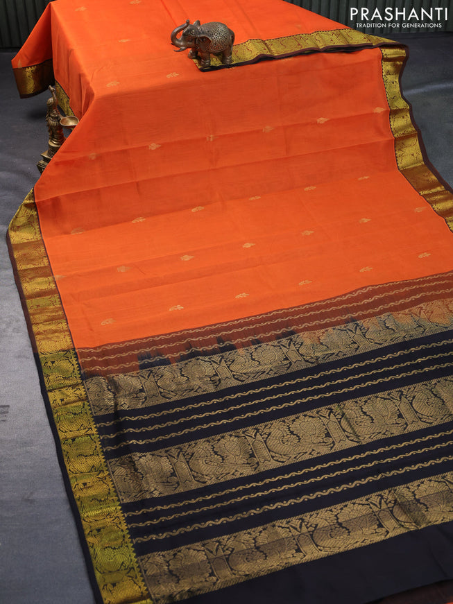 Silk cotton saree orange and black with zari woven buttas and annam zari woven border