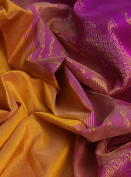 Silk cotton saree dual shade of dark mustard yellow and purple with zari woven buttas and zari woven border