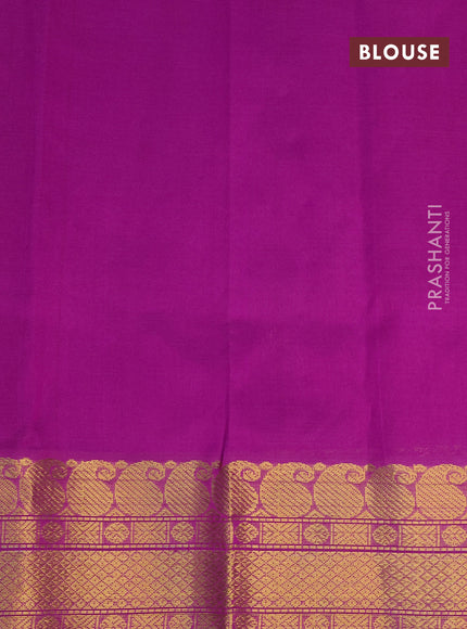 Silk cotton saree dual shade of dark mustard yellow and purple with zari woven buttas and zari woven border