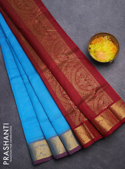 Silk cotton saree cs blue and maroon with allover vairosi pattern and peacock zari woven border