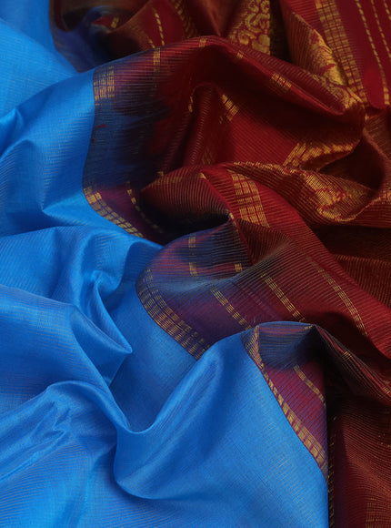 Silk cotton saree cs blue and maroon with allover vairosi pattern and peacock zari woven border