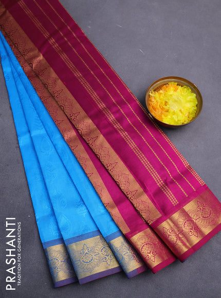 Silk cotton saree cs blue and purple with allover self emboss jacquard and zari woven border