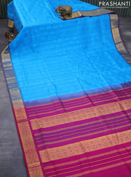 Silk cotton saree cs blue and purple with allover self emboss jacquard and zari woven border