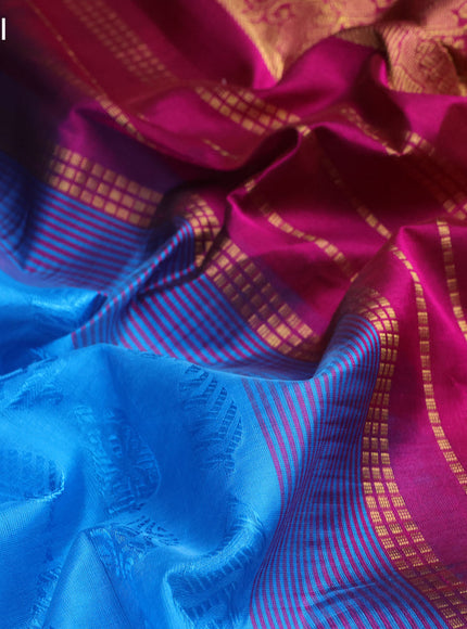 Silk cotton saree cs blue and purple with allover self emboss jacquard and zari woven border