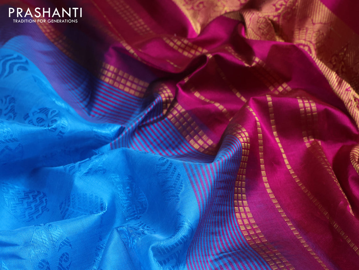 Silk cotton saree cs blue and purple with allover self emboss jacquard and zari woven border