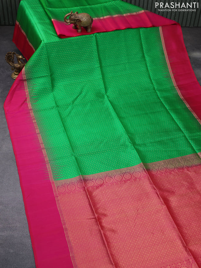 Pure soft silk saree green and pink with allover zari woven butta weaves and zari woven simple border