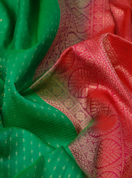 Pure soft silk saree green and pink with allover zari woven butta weaves and zari woven simple border