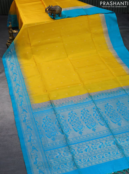 Pure soft silk saree mango yellow and dual shade of teal blue with zari woven buttas and rich zari woven border