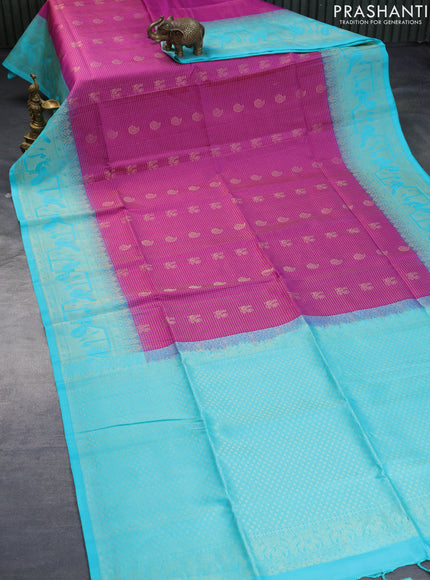 Pure soft silk saree purple and teal blue with allover zari woven checks & buttas and rich zari woven border