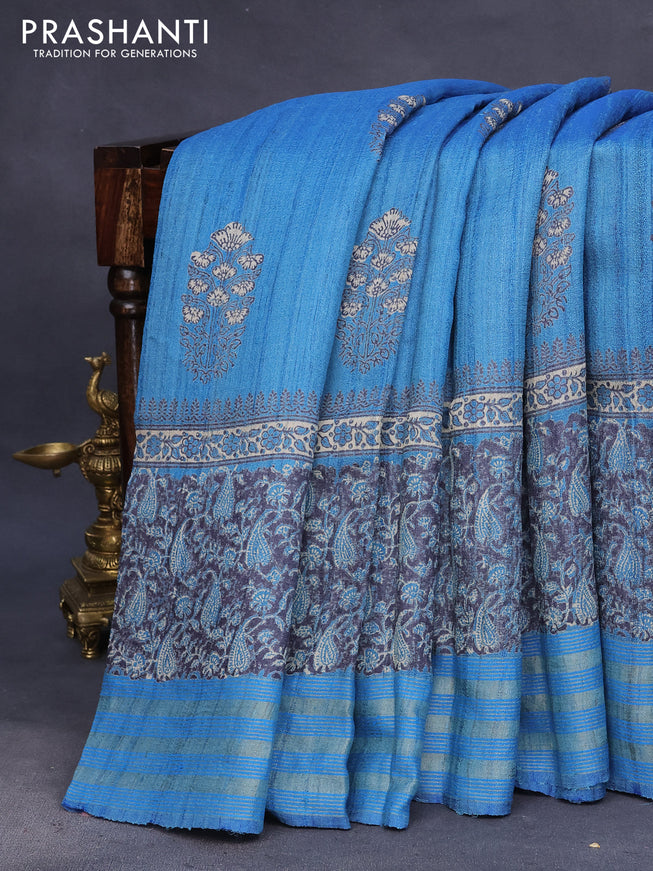 Banarasi tussar silk saree cs blue with allover prints and zari woven border