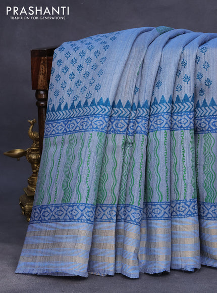 Banarasi tussar silk saree blue shade with allover prints and zari woven border