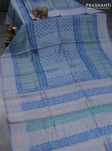 Banarasi tussar silk saree blue shade with allover prints and zari woven border