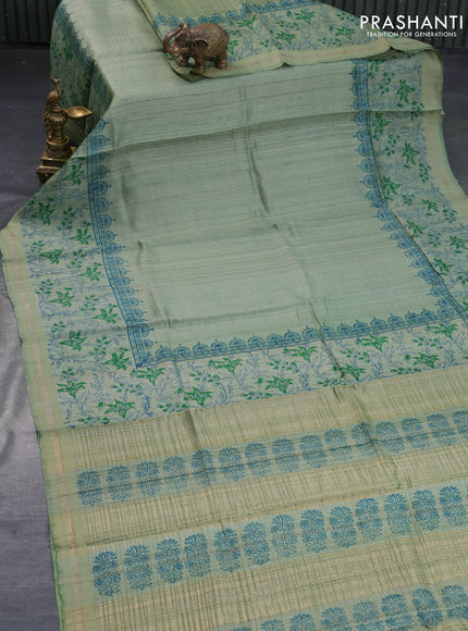 Banarasi tussar silk saree pastel green with plain body and printed pallu