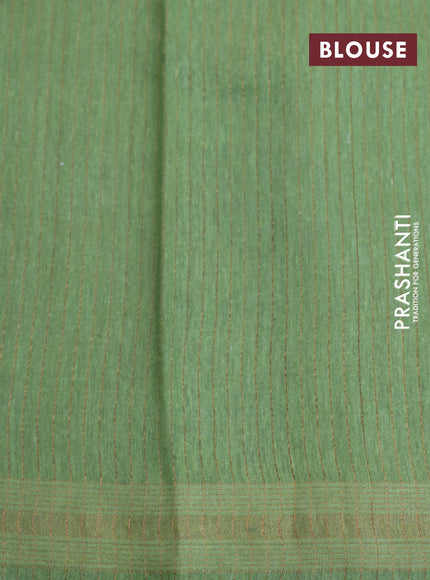 Banarasi tussar silk saree pastel green with plain body and printed pallu