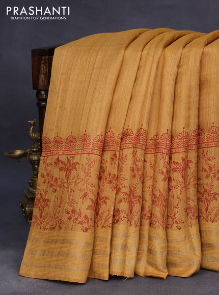 Banarasi tussar silk saree mustard yellow with plain body and printed pallu