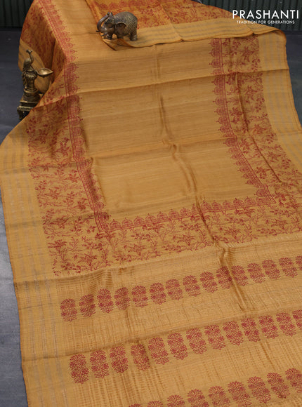 Banarasi tussar silk saree mustard yellow with plain body and printed pallu