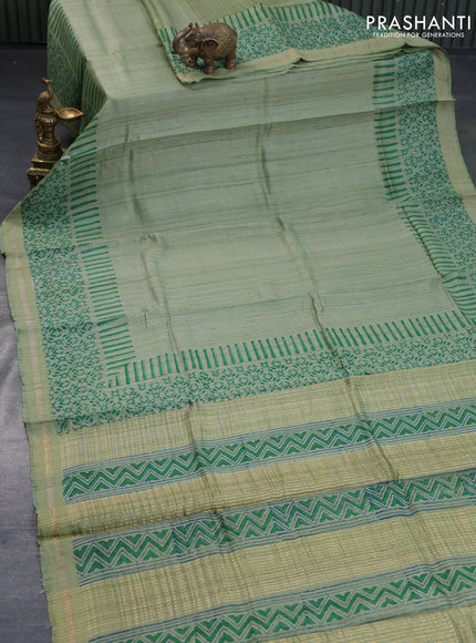 Banarasi tussar silk saree pastel green with plain body and printed pallu