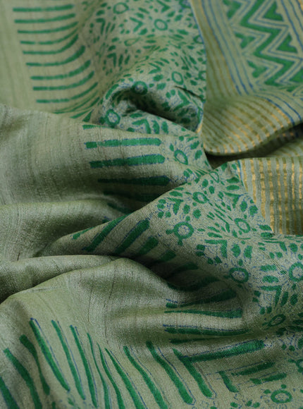 Banarasi tussar silk saree pastel green with plain body and printed pallu