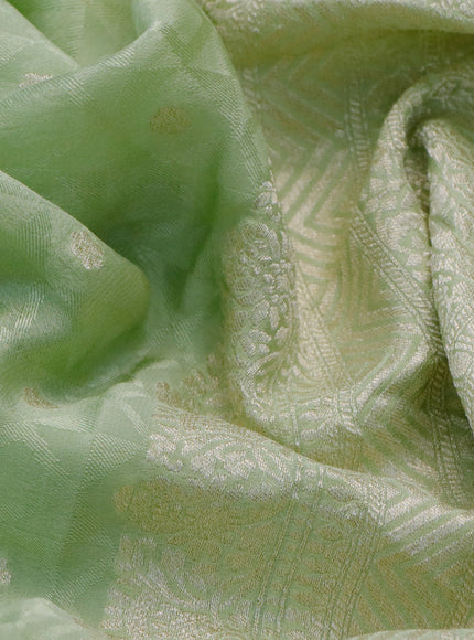 Pure banarasi crepe silk saree pista green with allover self emboss & zari buttas and zari woven border