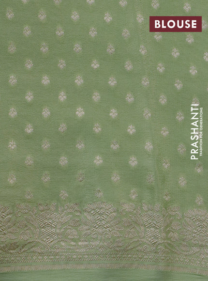 Pure banarasi crepe silk saree pista green with allover self emboss & zari buttas and zari woven border