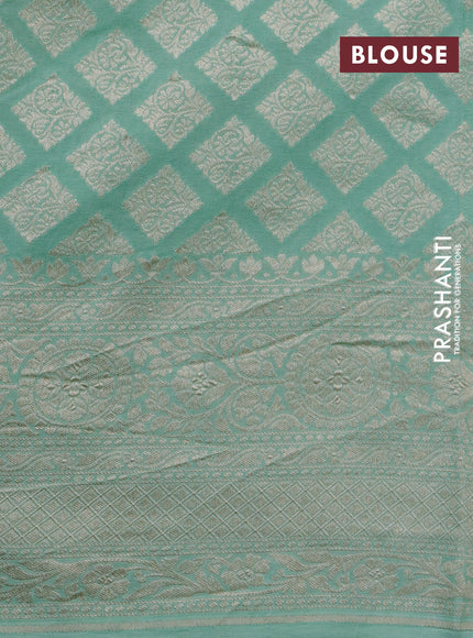 Pure banarasi crepe silk saree pastel green with allover self emboss & zari buttas and zari woven border