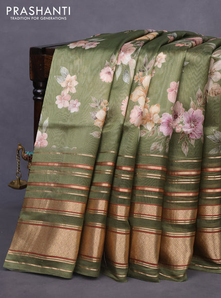 Pure dupion silk saree green shade with allover floral prints and long zari woven border