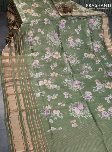 Pure dupion silk saree green shade with allover floral prints and long zari woven border