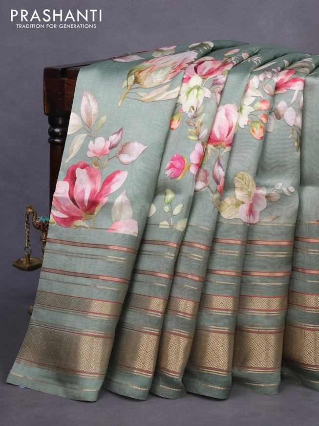 Pure dupion silk saree pastel green with allover floral prints and long zari woven border