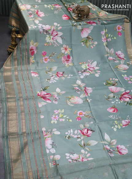 Pure dupion silk saree pastel green with allover floral prints and long zari woven border