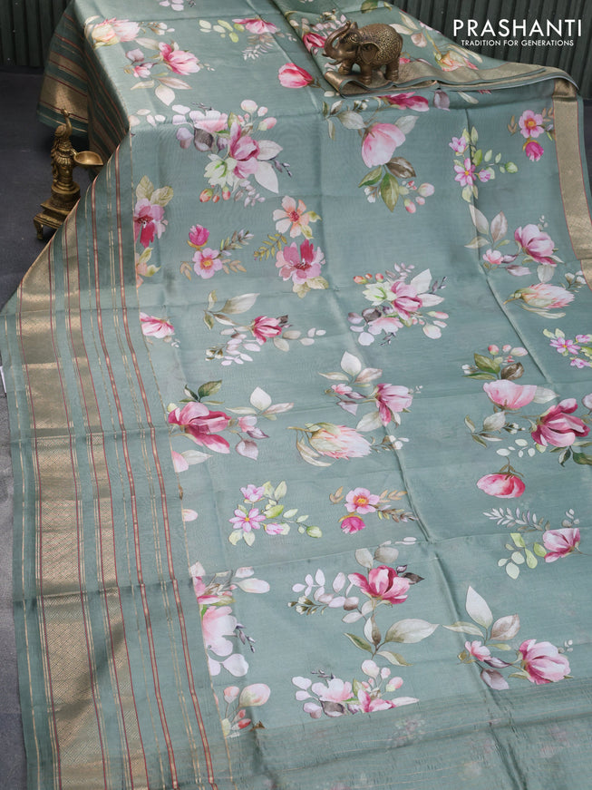 Pure dupion silk saree pastel green with allover floral prints and long zari woven border