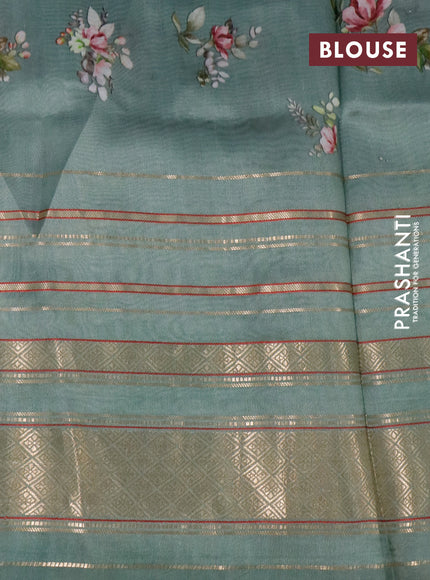 Pure dupion silk saree pastel green with allover floral prints and long zari woven border