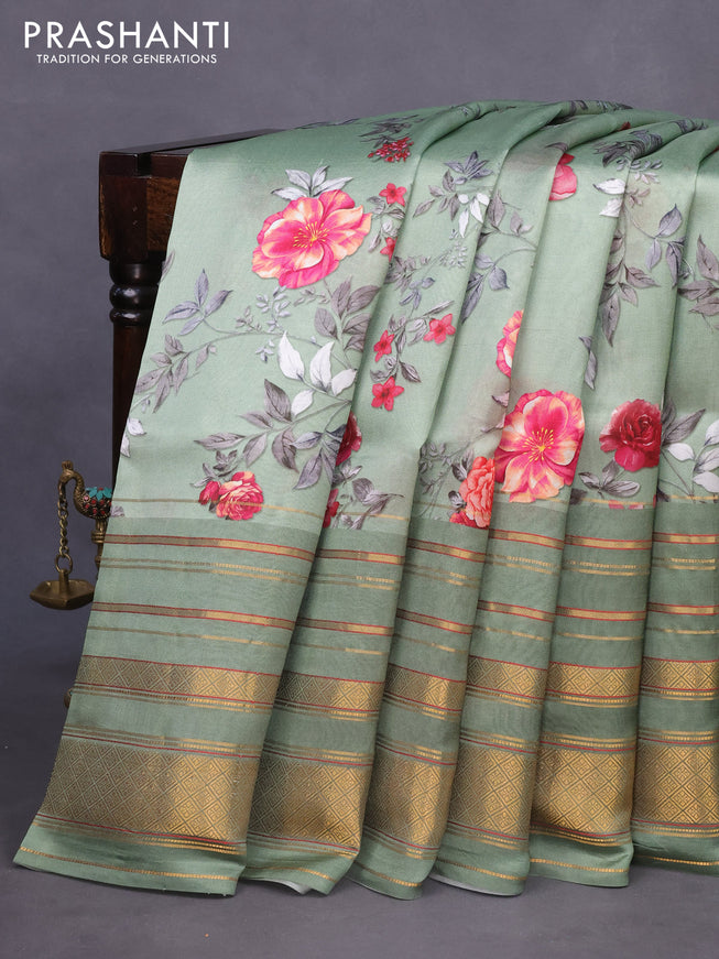 Pure dupion silk saree pastel green with allover floral prints and long zari woven border