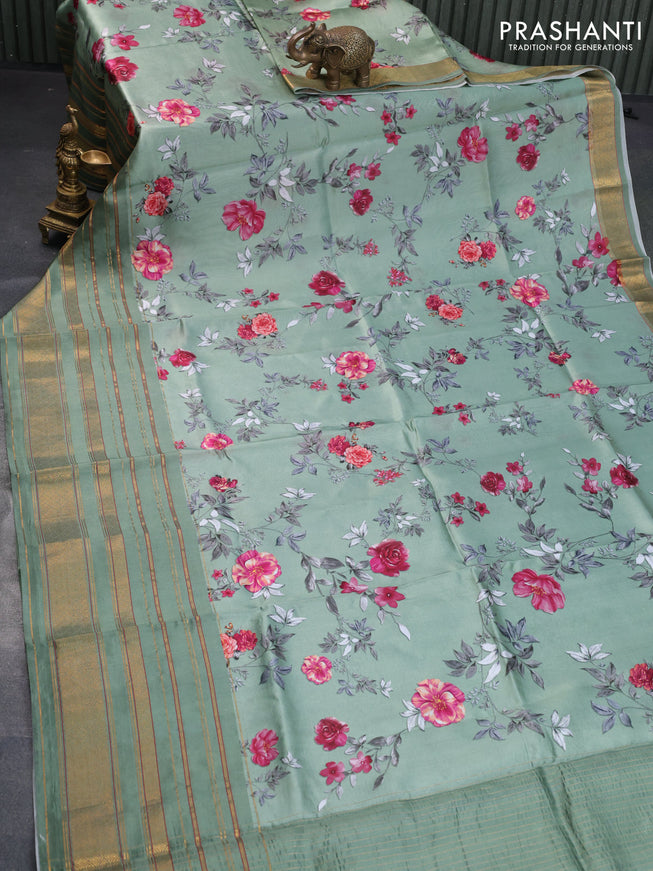 Pure dupion silk saree pastel green with allover floral prints and long zari woven border