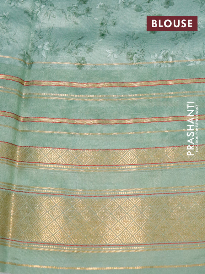 Pure dupion silk saree pastel green with allover floral prints and long zari woven border