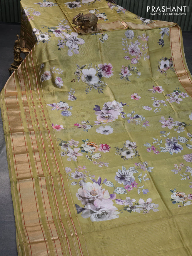 Pure dupion silk saree elaichi green with allover floral prints and long zari woven border