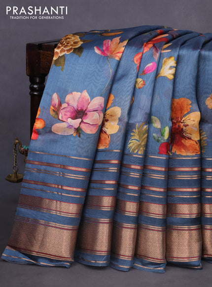 Pure dupion silk saree pastel blue with allover floral prints and long zari woven border