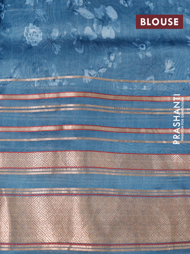 Pure dupion silk saree pastel blue with allover floral prints and long zari woven border