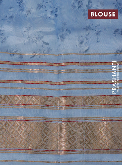 Pure dupion silk saree blue shade with allover floral prints and long zari woven border