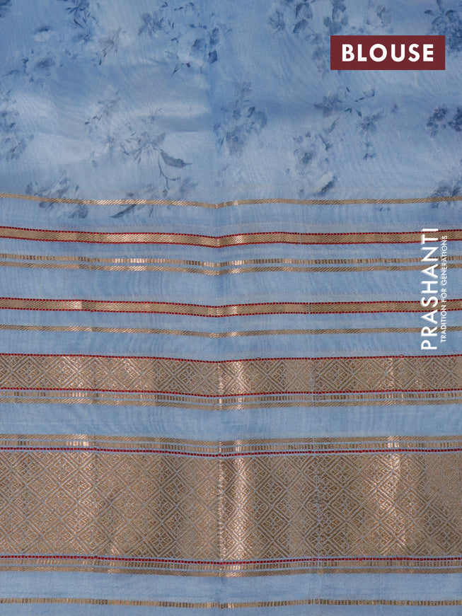 Pure dupion silk saree blue shade with allover floral prints and long zari woven border