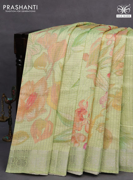 Chiniya silk saree pista green with allover silver zari checks & floral ptrints and silver zari woven border