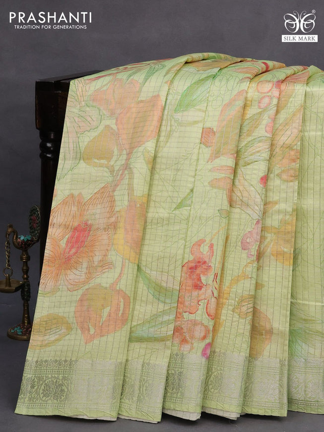 Chiniya silk saree pista green with allover silver zari checks & floral ptrints and silver zari woven border