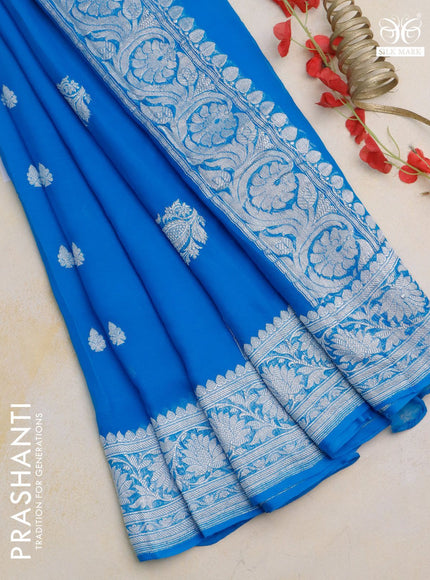 Banarasi chiffon silk saree cs blue with silver zari woven buttas and silver zari woven border