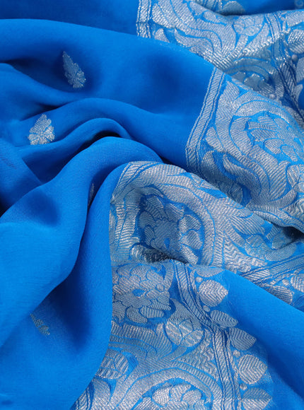 Banarasi chiffon silk saree cs blue with silver zari woven buttas and silver zari woven border