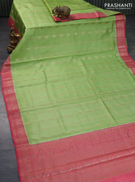 Chiniya silk saree light green and pink with allover zari woven buttas and zari woven border