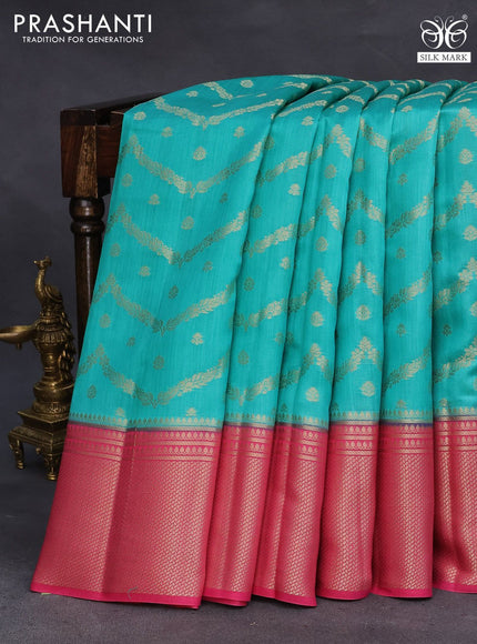 Chiniya silk saree teal green and pink with allover zari weaves and long zari woven border