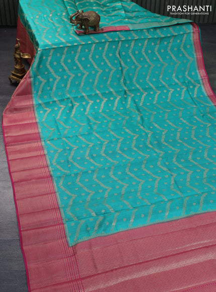 Chiniya silk saree teal green and pink with allover zari weaves and long zari woven border